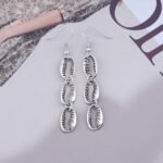 Vintage Metal Cowrie Drop Earrings Puka Shell Dangle Earrings Long Shell Hook Ea... - Image 4